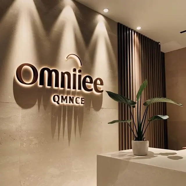 Omniiee halo-lit dimensional letters on a reception feature wall